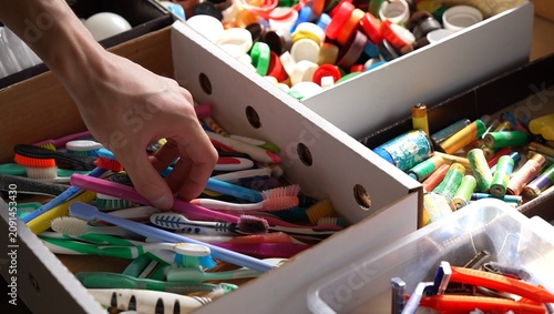 Fotografie Used toothbrushes waste. Recycling toothbrushes. Waste Management