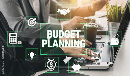 Quadro su tela Detailed and Strategic Budget Planning for Financial Success with Laptop and Business Icons Illustrating Key Concepts in a Modern Office Setting Fluxor