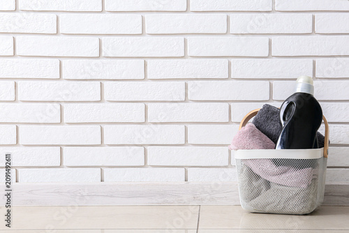 Laundry basket with deterge...