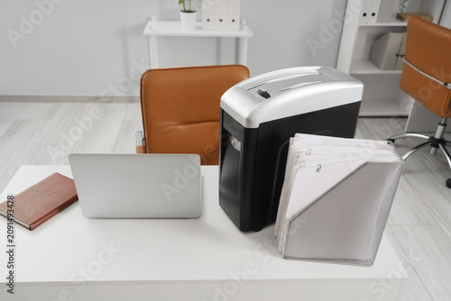 Modern shredder with folder...