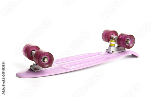 Pink skateboard on white ba...