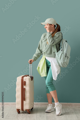 Young woman with backpack a...