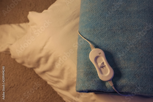Folded electric heating pad...