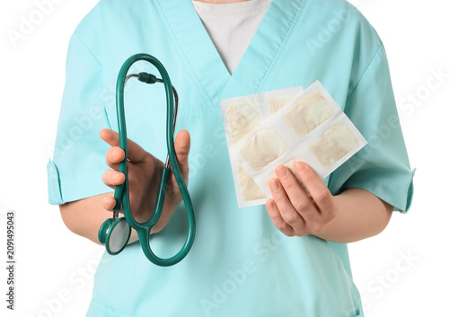 Female doctor with mustard ...