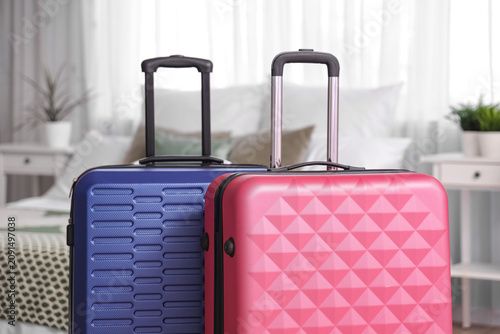Packed suitcases in interio...