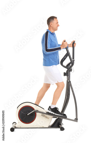 Sporty mature man on exerci...