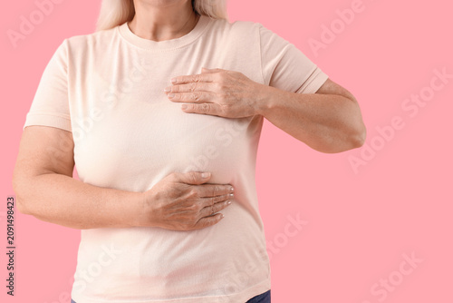 Mature woman checking her b...