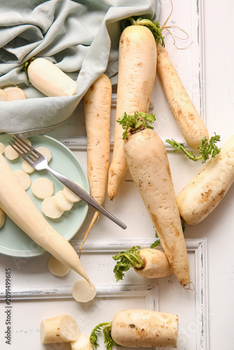 Plate with fresh daikon rad...