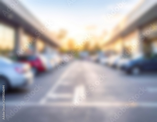 Blurry street scene with soft bokeh background and sunlight