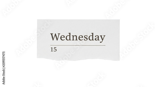 The word wednesday written on piece of paper with black and white.