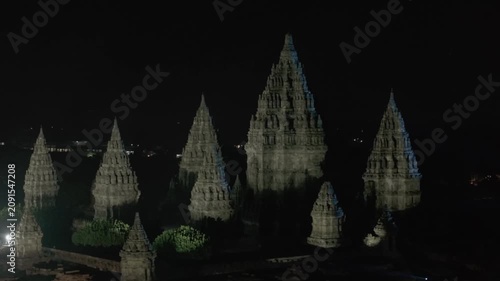 Aerial drone footage of Prambanan Temple at night, featuring illuminated ancient architecture and a cinematic view of Indonesia’s cultural heritage landmark.