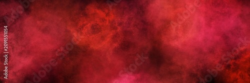 Fotografija Vibrant crimson red and deep burgundy smoke clouds on black