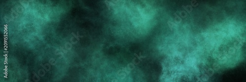 Foto Deep malachite green and teal misty haze on black