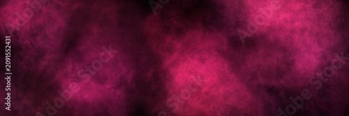 Foto Deep ruby red and dark magenta foggy smoke on black