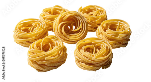 Golden Yellow Tagliatelle Pasta Nests Isolated on Transparent Background Showing Detailed Texture