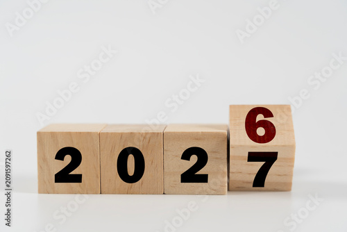 2027 New Year Change Concept with Wooden Blocks on White Background