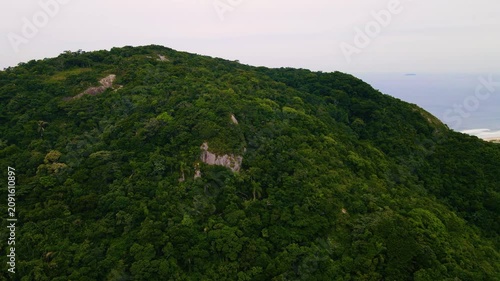 Lush green mountains and dense forest canopy viewed from above