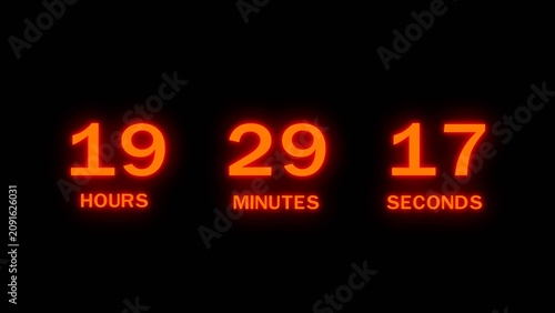 Photos Red glowing digital countdown timer showing 19 hours 29 minutes and 17 seconds on black background