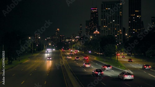 Cars Traveling on Lake Shore Drive Chicago at Night with Stunning City Lights