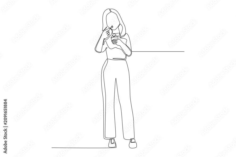 Obraz premium Minimalist single line drawing of a human subject, a standing woman who is holding a small cup and eating ice cream with a small spoon, captured in a clean black outline vector style.