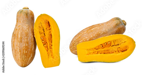 Vászonkép Close-up of Two Groups of Butternut Squash Whole and Halved on White Background