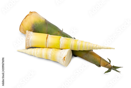 Foto Close-up of Fresh Spring Bamboo Shoots Shelled and Peeled on White Background