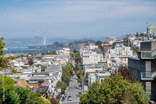 Fotografie San Francisco city view from Lombard Street toward the Bay Bridge