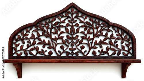 This image displays a dark wooden wall shelf featuring an intricate, arched lattice back panel carved with elegant floral and leaf patterns against a plain white background.