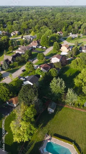 Vertical Drone Shot of a Picturesque Suburban Residential Neighborhood