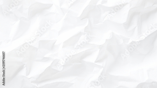 Crinkled white paper texture background with creases and folds abstract design element