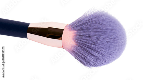 Fotografía Fluffy purple makeup brush with rose gold ferrule and navy handle, isolated on t