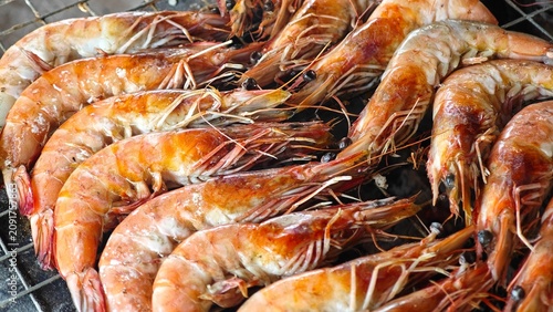 Grilled shrimp on charcoal stove.