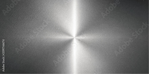 Fotografie A gleaming metallic surface with a radial brushed pattern, reflecting light to create a dramatic, futuristic texture