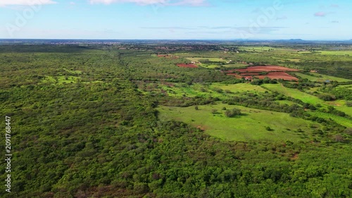 Aerial Landscape of Green Fields and Native Vegetation in Rural Brazil