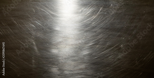 Tableau sur toile Close-up of hairline finished stainless steel sheet with black and white monochrome tone and metallic luster