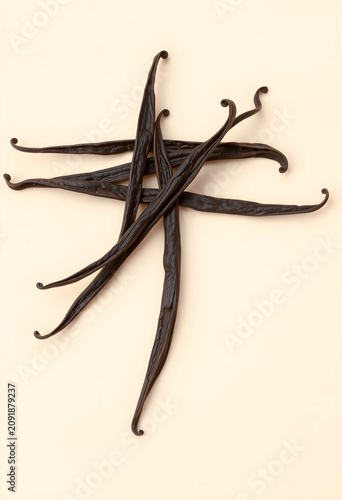 Five fresh vanilla pods arr...