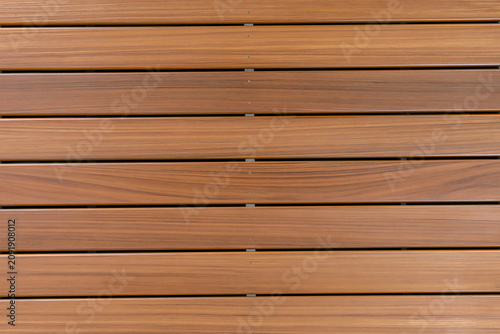 Contemporary Teak Wood Slatted Wall Panels or Privacy Screen Background Surface Texture
