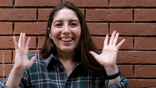 фотографія A surprised, delighted woman