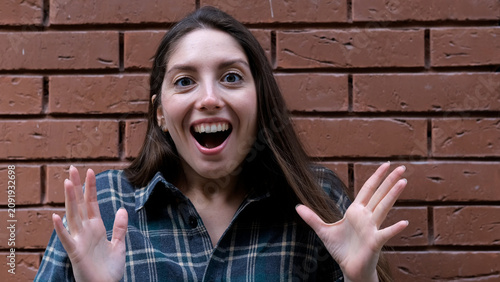 Cuadro en lienzo A surprised, delighted woman