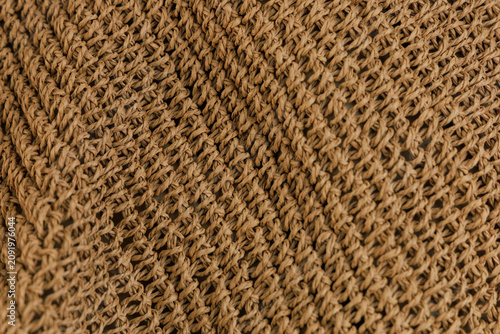 Fotografie Texture background shows weaving pattern made from natural fibers in a craft set