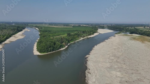 Po river dry riverbed and low water levels revealing sandy beaches between Cremona and Piacenza, highlighting effects of heatwave and climate change