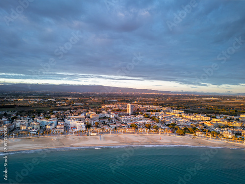 Aerial Sunset View of Coastal Beach Town With Promenade, Cambrils, Catalonia, Spain