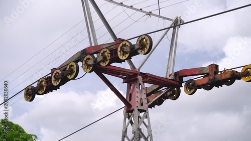 Shot of multiple large pulleys of a Ropeway carriage mechanism used for transporting cargo or passenger by cable