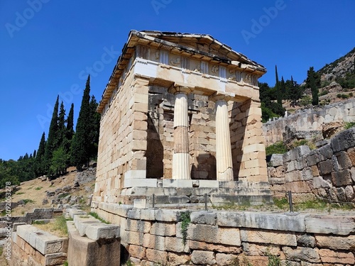 фотографія Photo of the Athenian Treasury at Delphi, Greece, built by the Athenians to safeguard dedications and votive offerings presented to the sanctuary of Apollo