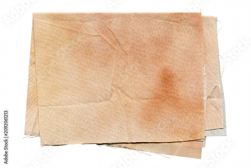 Foto Old Stained Beige Cloth Pieces Stacked