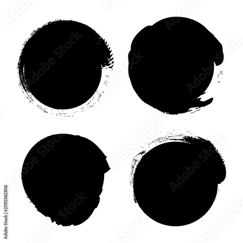 Circle grunge paint spot set black vector shape features rough textures. The ink smear collection visualizes artistic drops.
