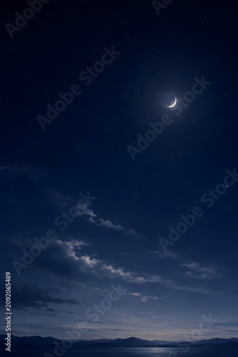Serene moonlit night over mountains