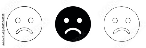 Fotografie Three sad face icons in a row, one filled black and two outlined