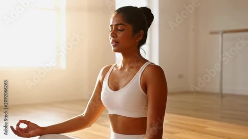 Peaceful Woman Practicing Yoga Meditation at Sunrise | Wellness and Mindfulness Lifestyle