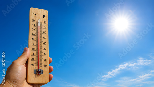 Wooden Thermometer Under Summer Sun